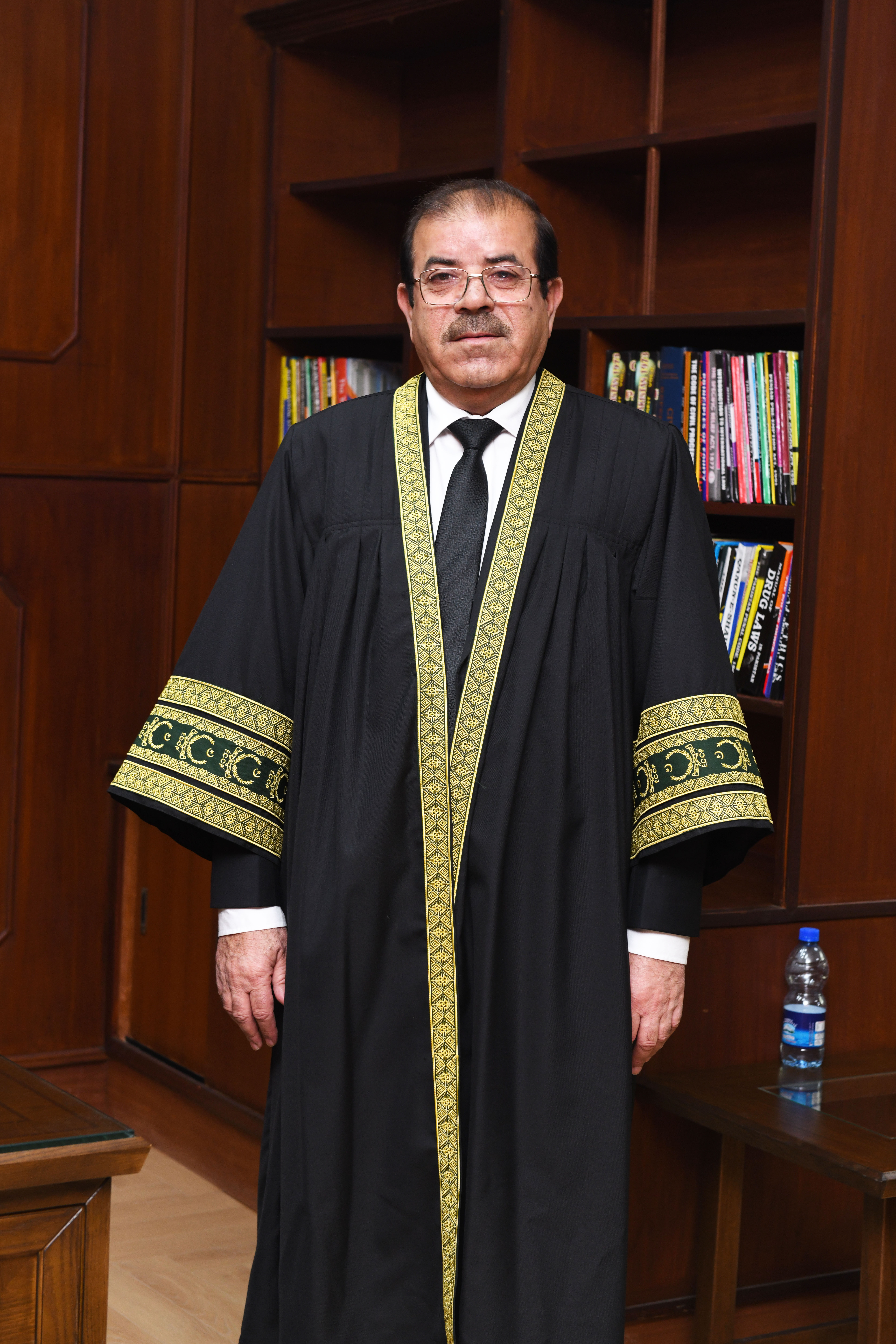 Mr. Justice Rozi Khan Barrech